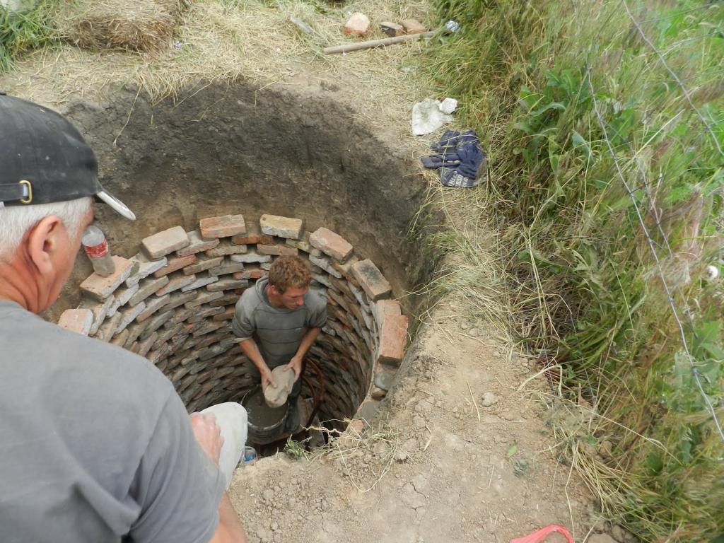 distância de um tanque séptico para um recorte de casa